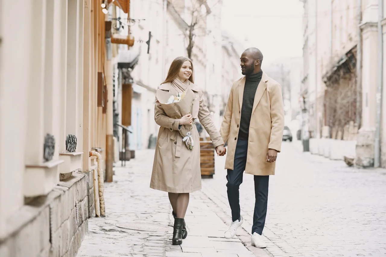 Couple walking together in Toronto — confident dating after working with a dating coach